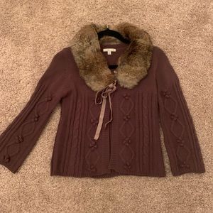 Ultra feminine fur trimmed sweater.